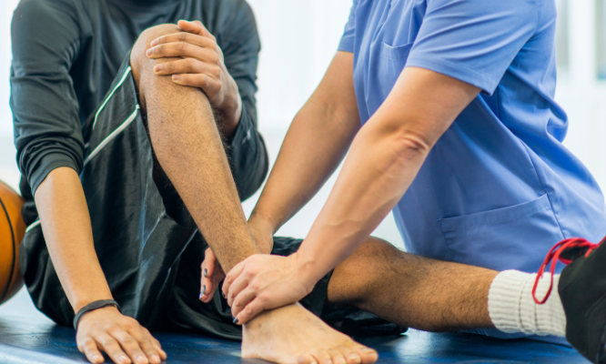 A man getting treatment and rehab for his achilles tendonitis 